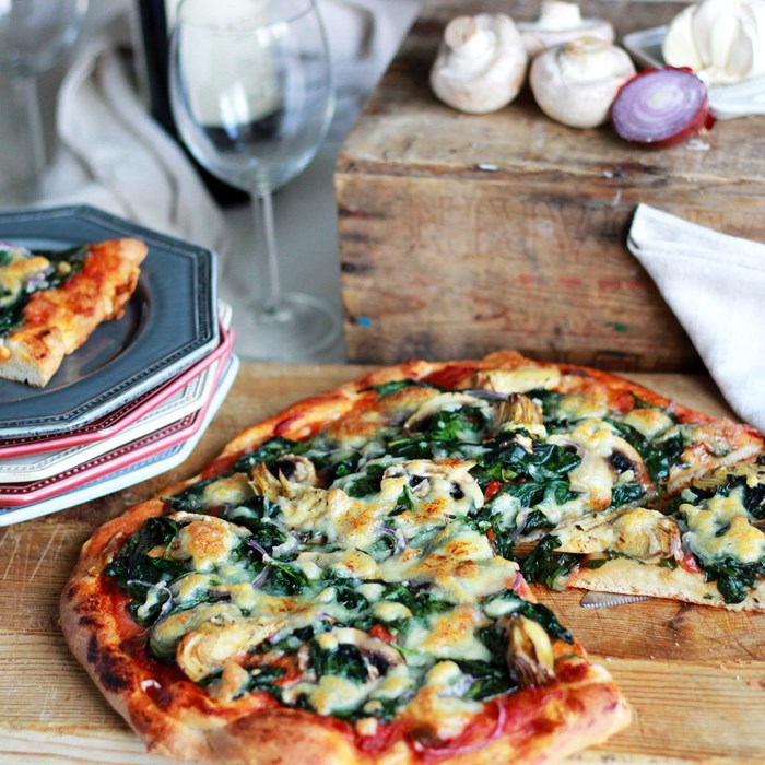 Spenatpizza med skockor och mozzarella Spenatpizza med skockor och mozzarella