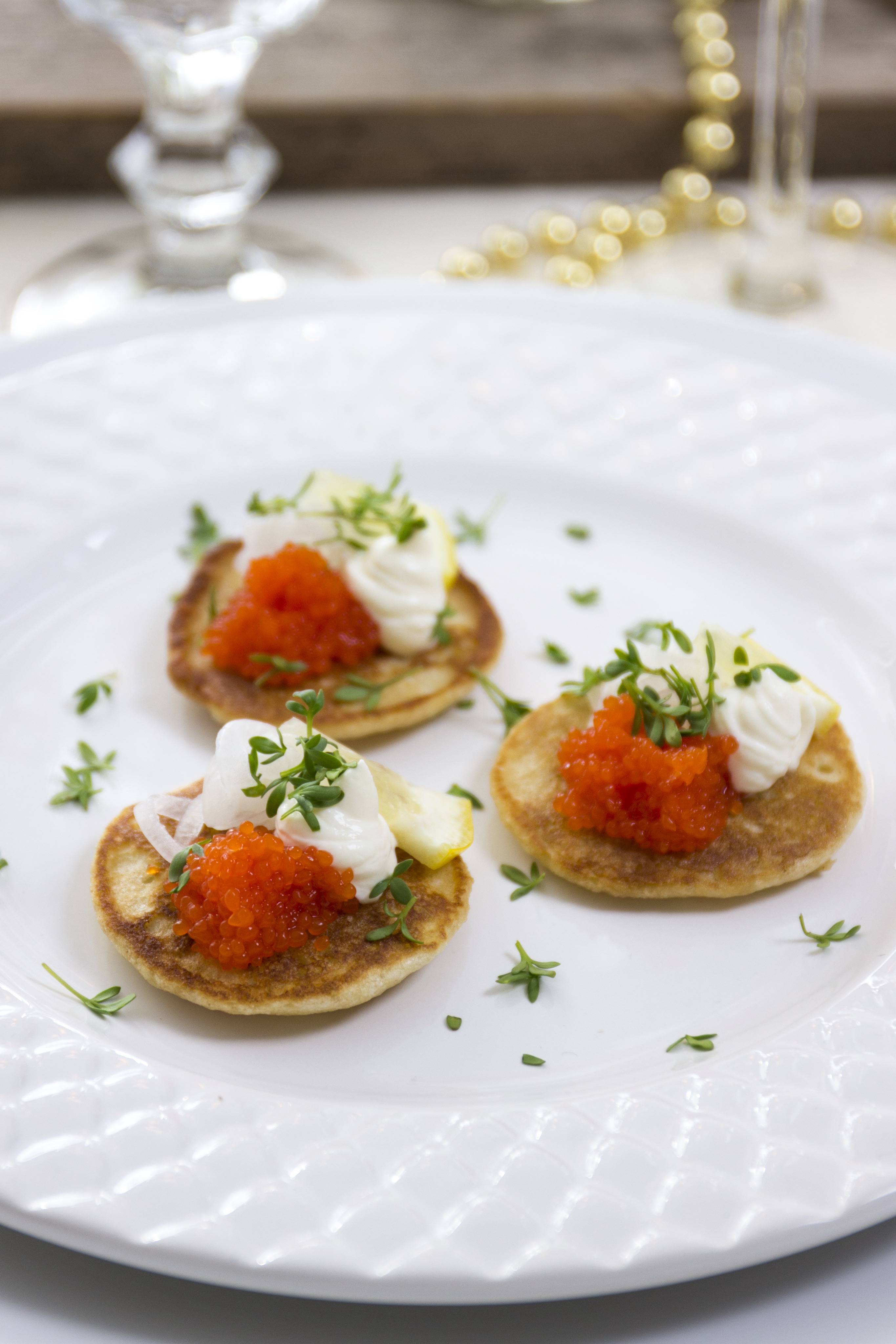 Blinier med silverlök och kaviar